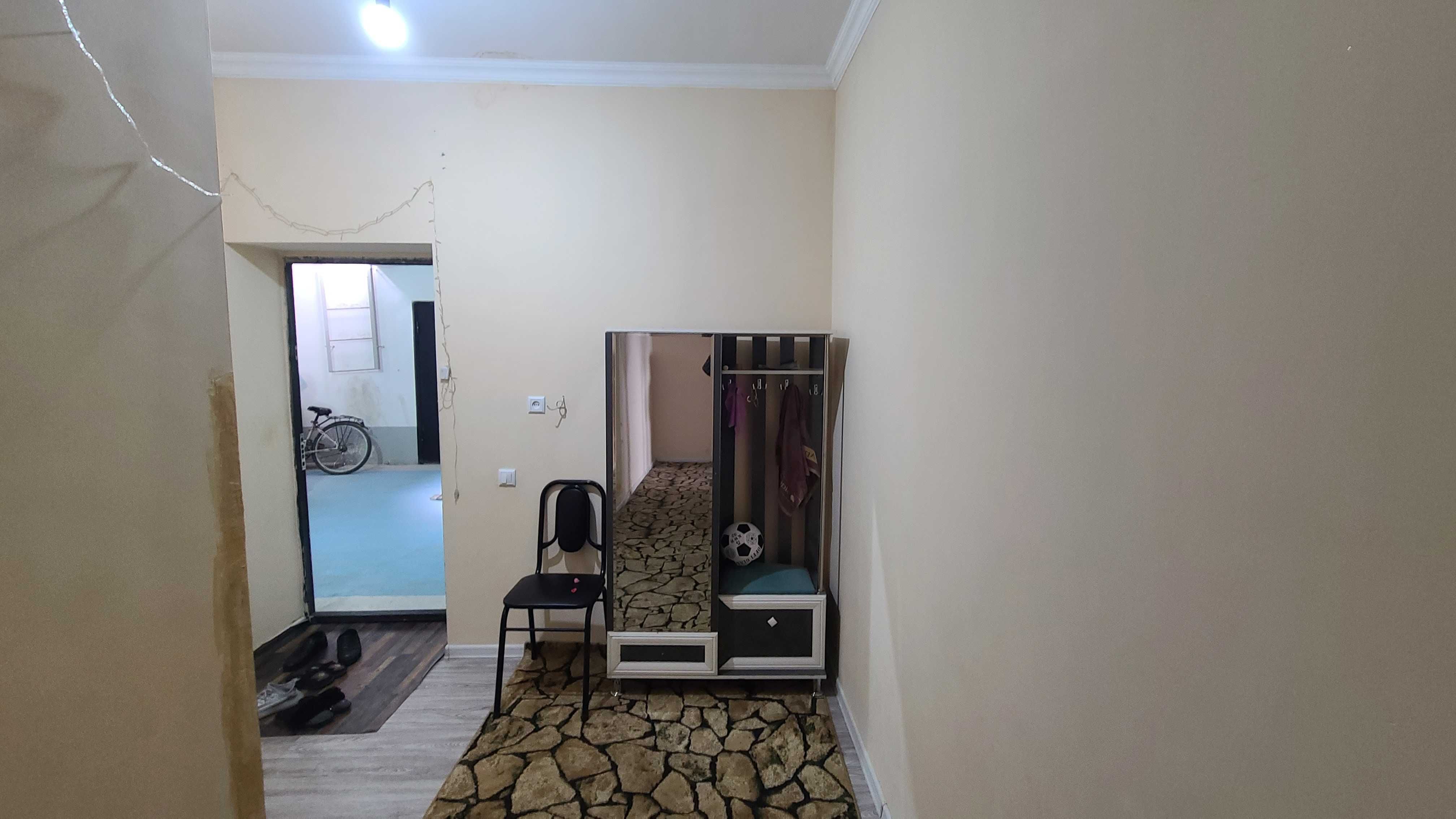 Ko`p qavatli uydagi xonadon