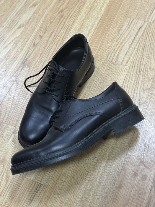 Продам кожные туфли