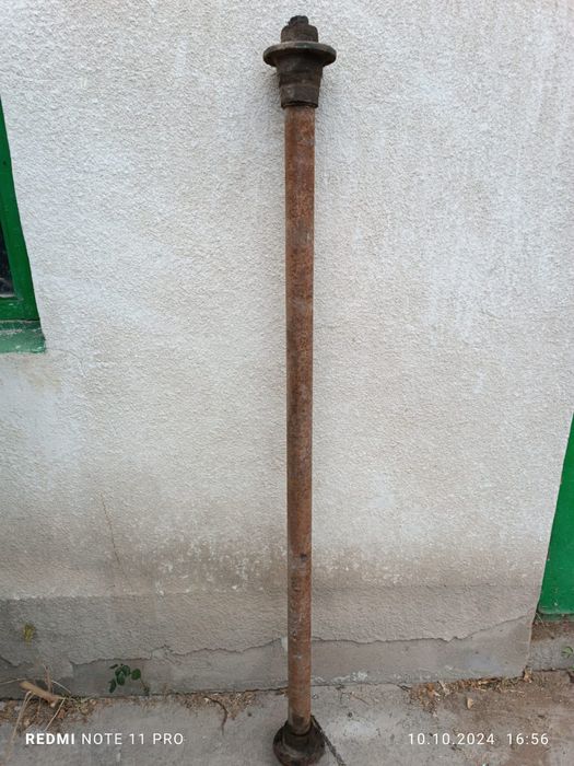 Ось для прицепа автомобиля.