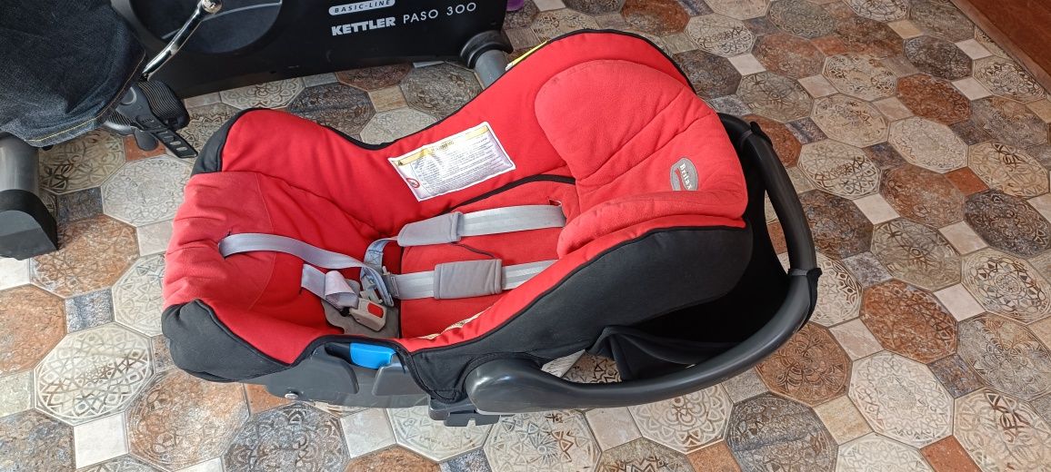 Scoică Britax Romer 0-13 kg cu prindere în centură cu spatele