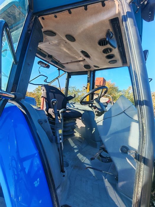 Tractor New Holland Tl 100 cu încărcător frontal quicke q 56