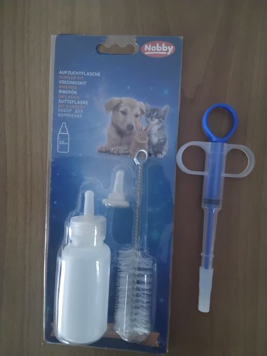 Dispozitiv util  ptr  căței și pisici