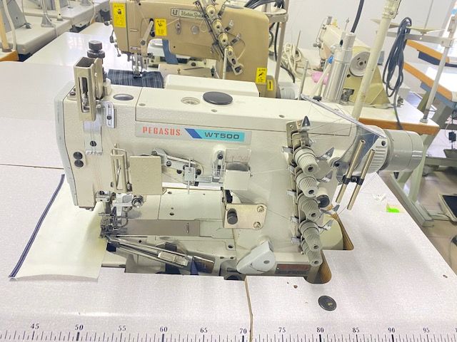 Masina pentru cusatura de acoperire si aplicat bentita Pegasus WT562