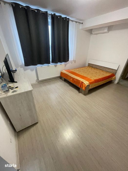 Garsonieră modernă, mobilată și utilată complet,loc de parcare inclus