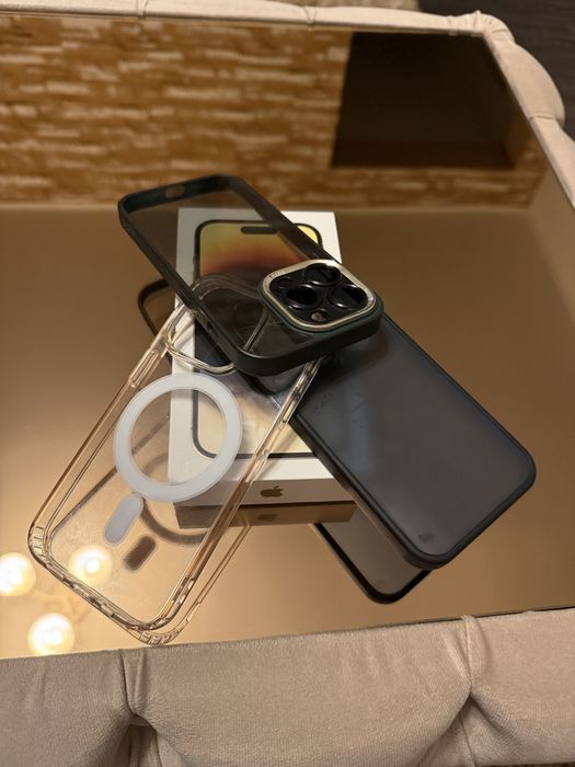 - IPHONE -14-PRO GOD/128 gb,full box,battery health 85%