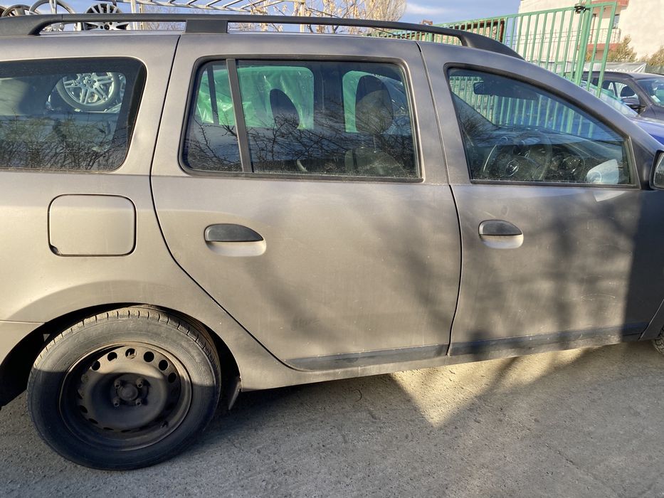 Haion cu lunetă Dacia Logan MCV 2014 mic defect stânga jos