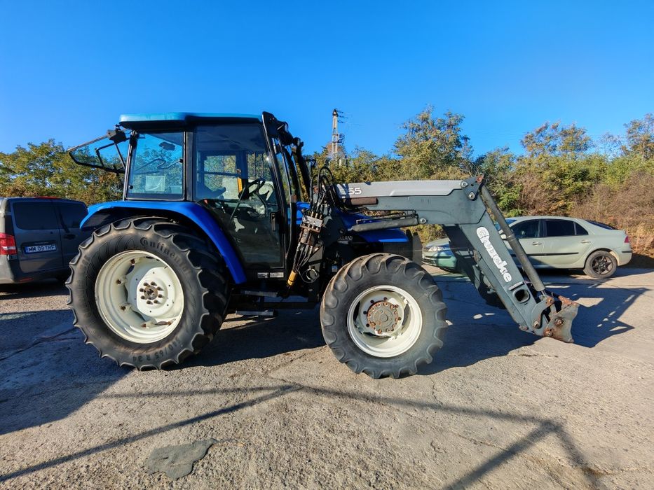 Tractor New Holland Tl 100 cu încărcător frontal quicke q 56