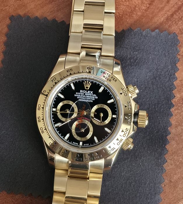 Rolex daytona gold