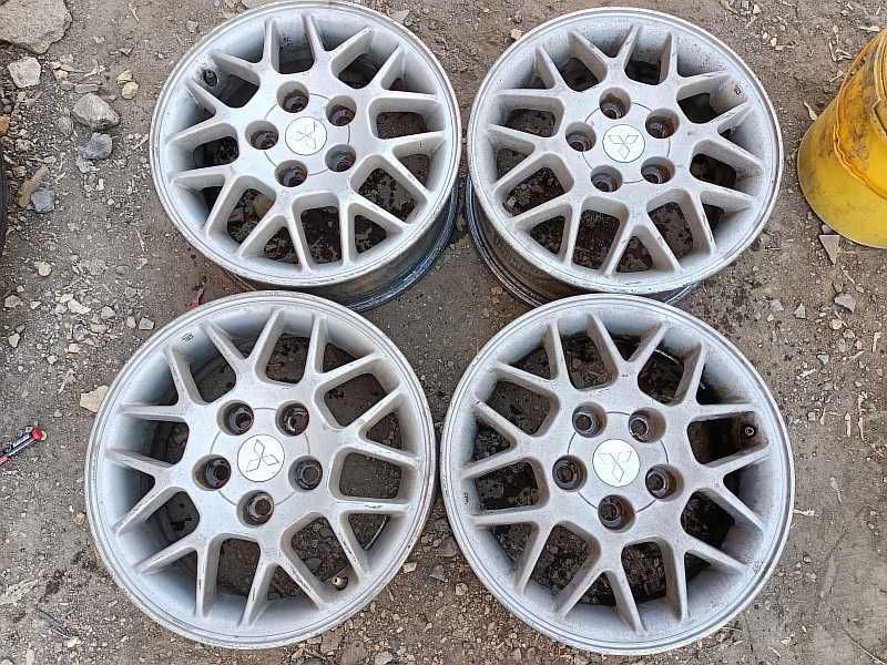 Продам оригинальные легкосплавные диски на автомашину Mitsubishi