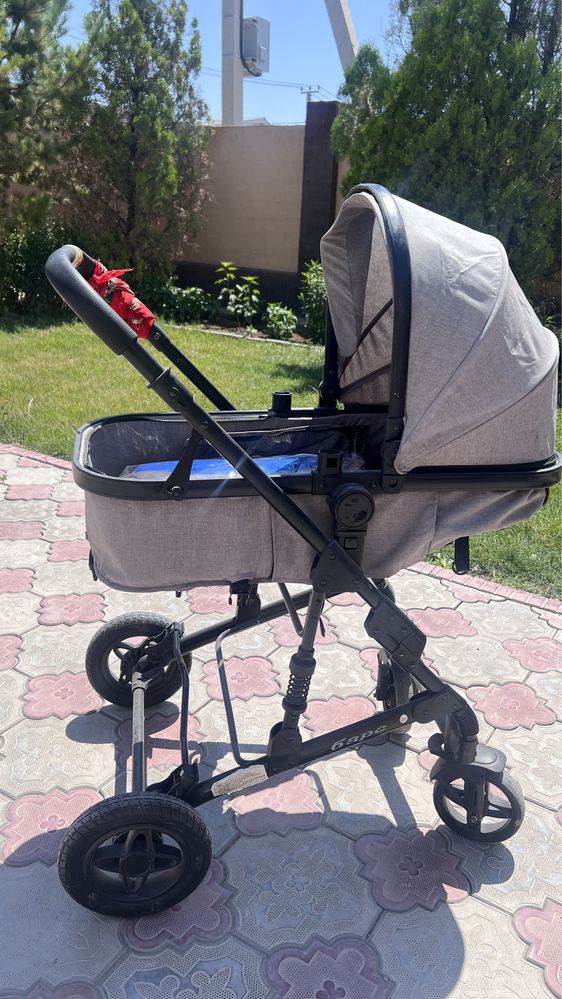 Продаю Детскую коляску серого цвета