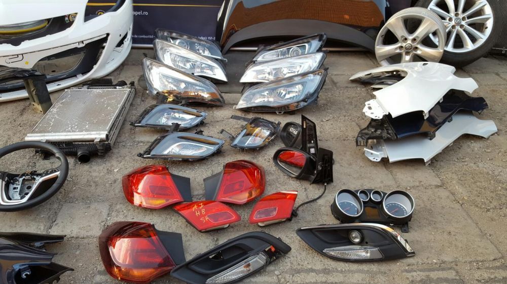 Opel Astra J, faruri, bări protecție, stopuri