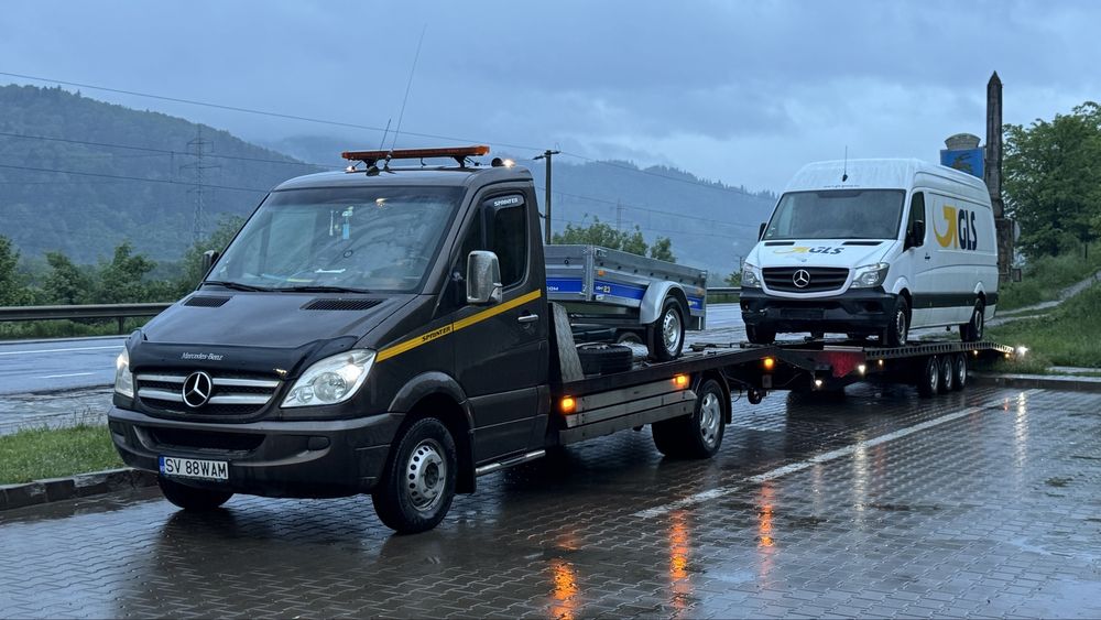 Transport auto pe platformă România-Italia și Italia-România