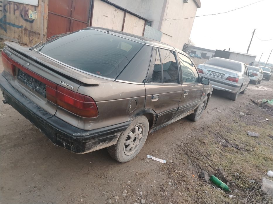 Митцубиси лансер по запчастям