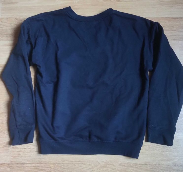 Bluză cu mânecă lungă pentru copii de 10-12 ani.