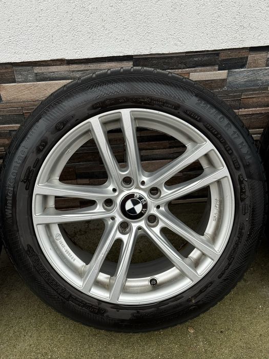 Vand jante originale BMW r17 echipate cu anvelope de iarna