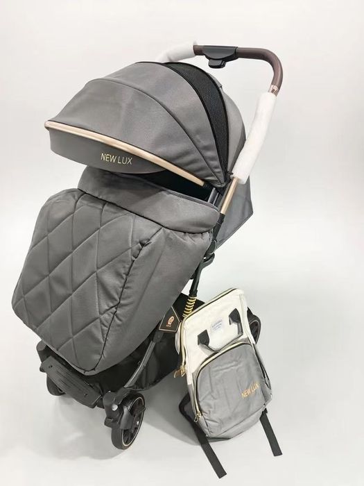 Коляска NEW LUX прогулочная с утеплённым чехлом и рюкзаком