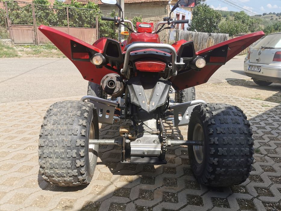 Vând quad access
