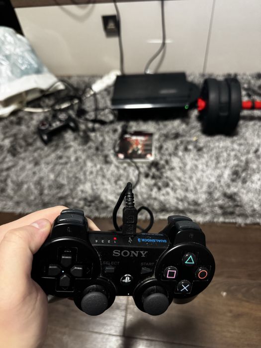 Playstation 3 super slim cu 2 controllere si 6 jocuri