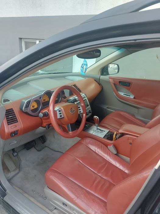 Schimb nissan murano cu scuter electric model soco