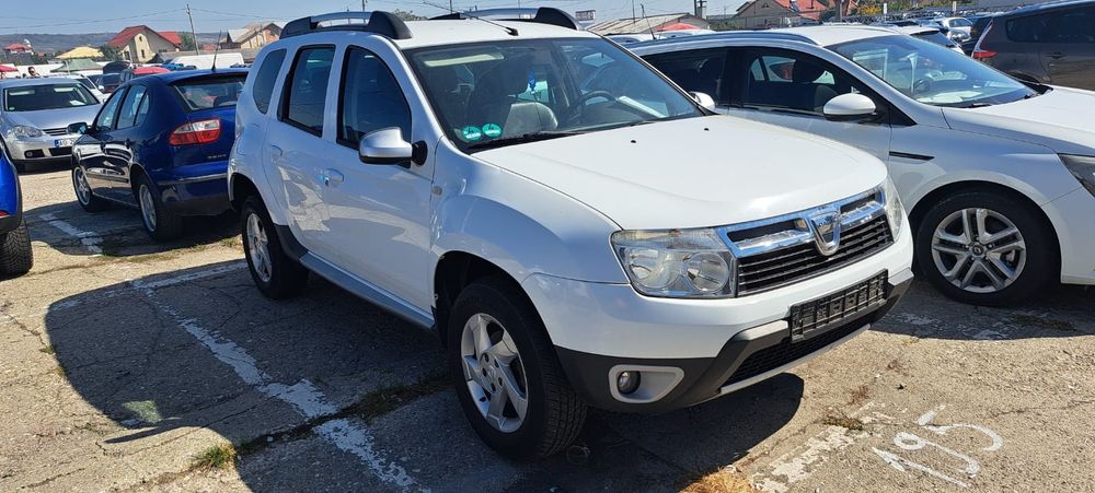 Duster 1.6,2×4,2012,piele,AC,scaune încălzite