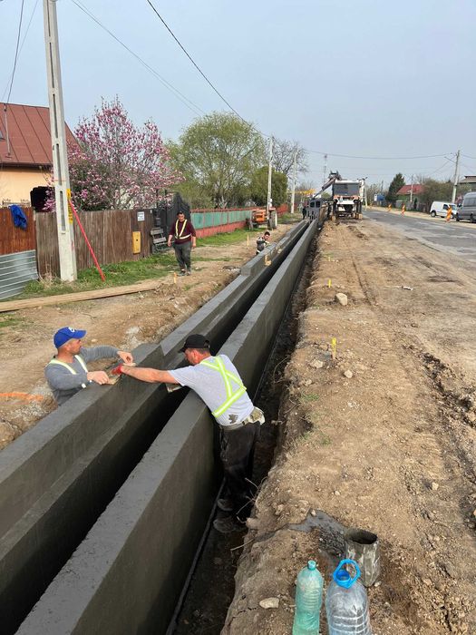 Santuri si rigole betonate  rigole de acostament realizate mecanizat
