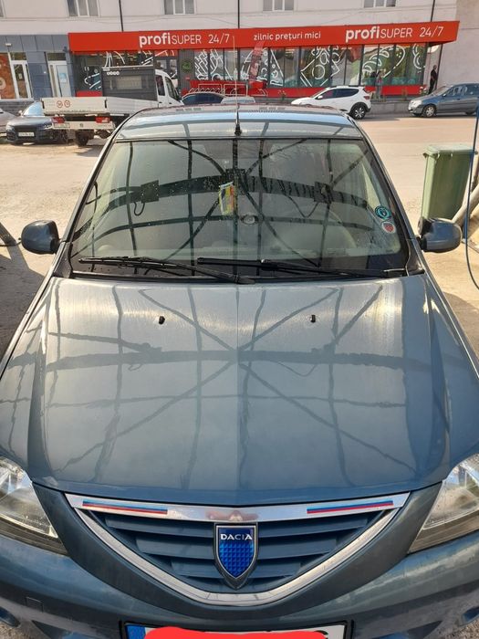 Dacia Logan, 1.6 16V • 2006 • 165.000 KM • Albastru • Navigație