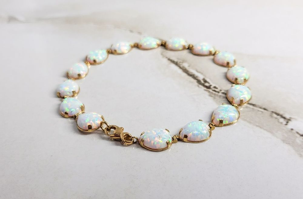 Brățară din aur de 14K cu Opal gramaj 7,02 gr