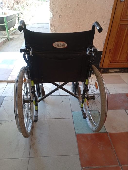 Инвалидная коляска