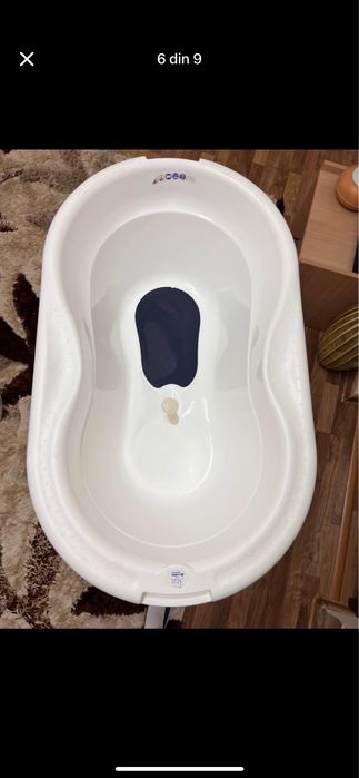 Cadita Rotho-babydesign cu suport inalt si reductor de dus