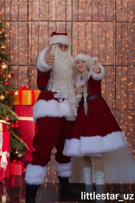 Дед Мороз  снегурочка и Санта клаус  с миссис клаусом