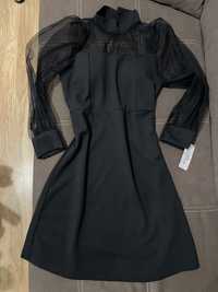 Елегантна черна рокля с тюлени ръкави