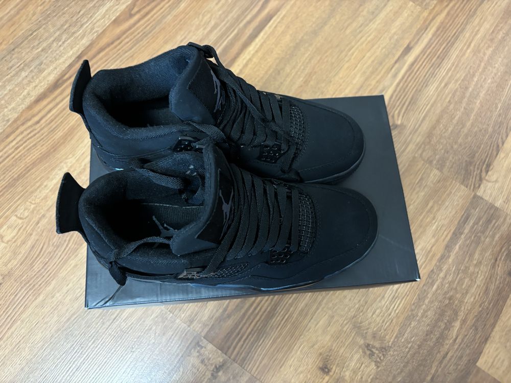 Jordan 4 black cat