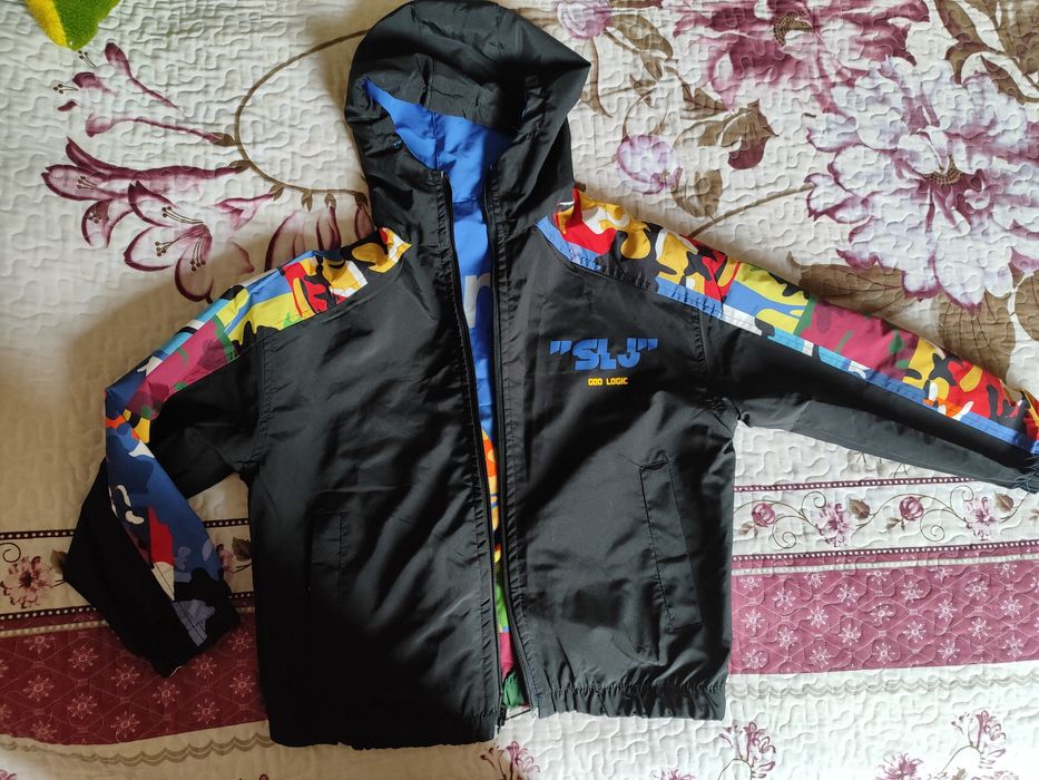 Продам ветровку -куртка. Двухсторонняя