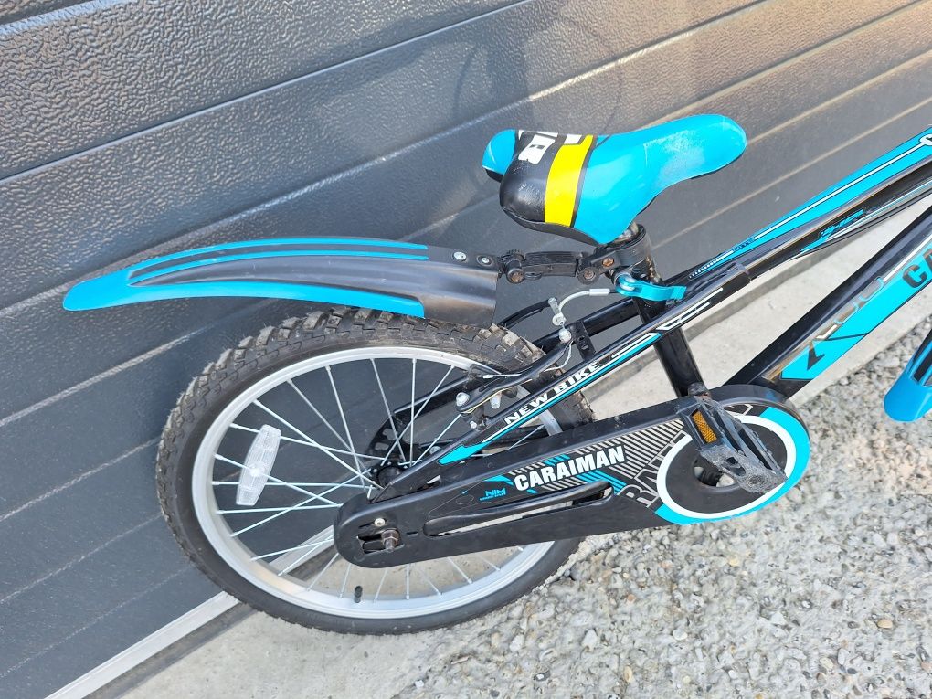 Bicicleta  cu roti pe 20 pentru copii 6-10 ani