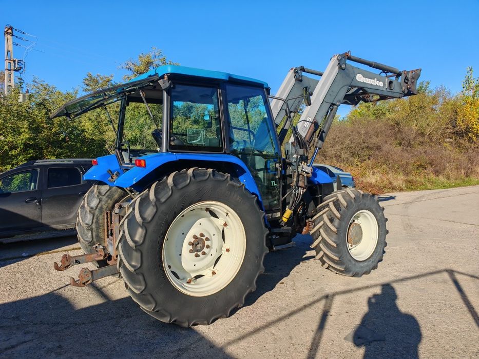 Tractor New Holland Tl 100 cu încărcător frontal quicke q 56