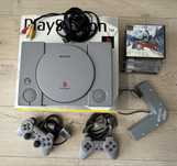 Consola Playstation (PS1) in cutie cu accesorii si jocuri