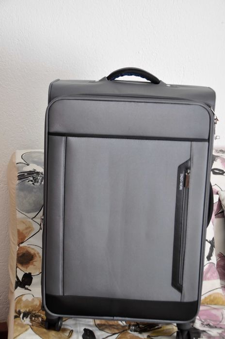 Продавам чисто нов куфар 30 инча