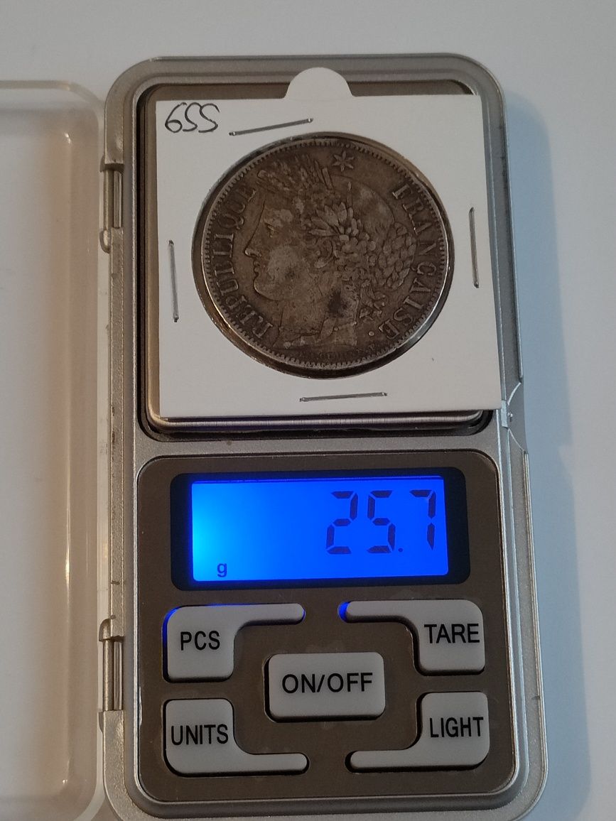 Vând moneda argint