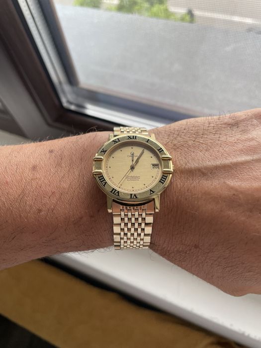 Omega Constellation aur 18 k automatic accept crypto