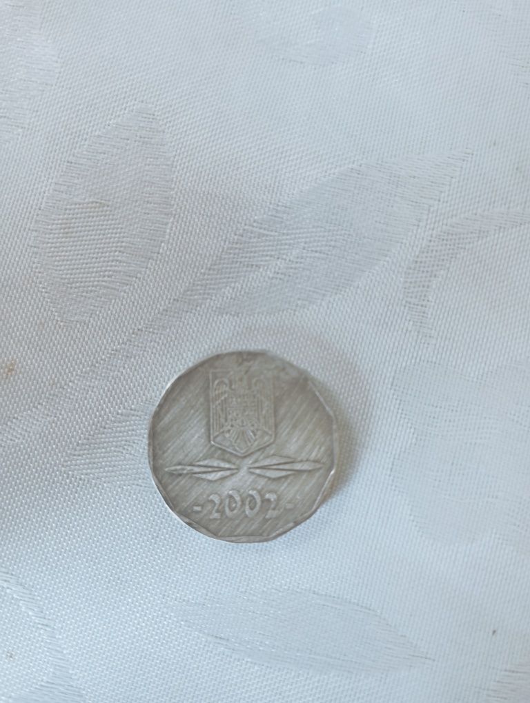 Vând monedă 2002