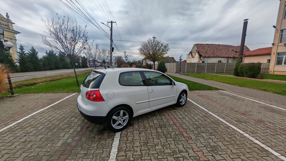 Vw golf 5 an 2009  1.4 benzina