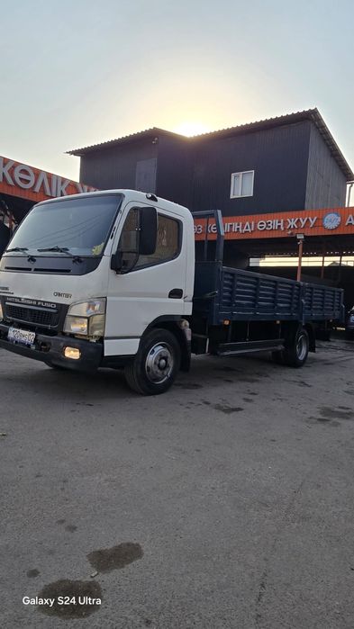 Грузоперевозки по городу 5 тонник доставка по городу бортовой машины