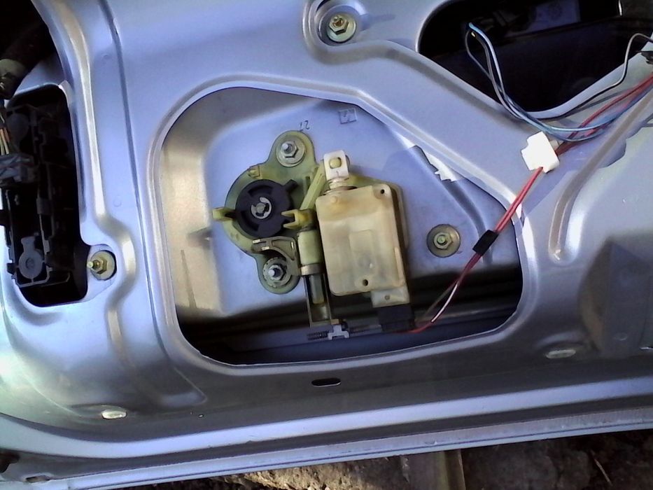 Haion luneta Renault Laguna,inchidere elect.,motoras stergator,brat..