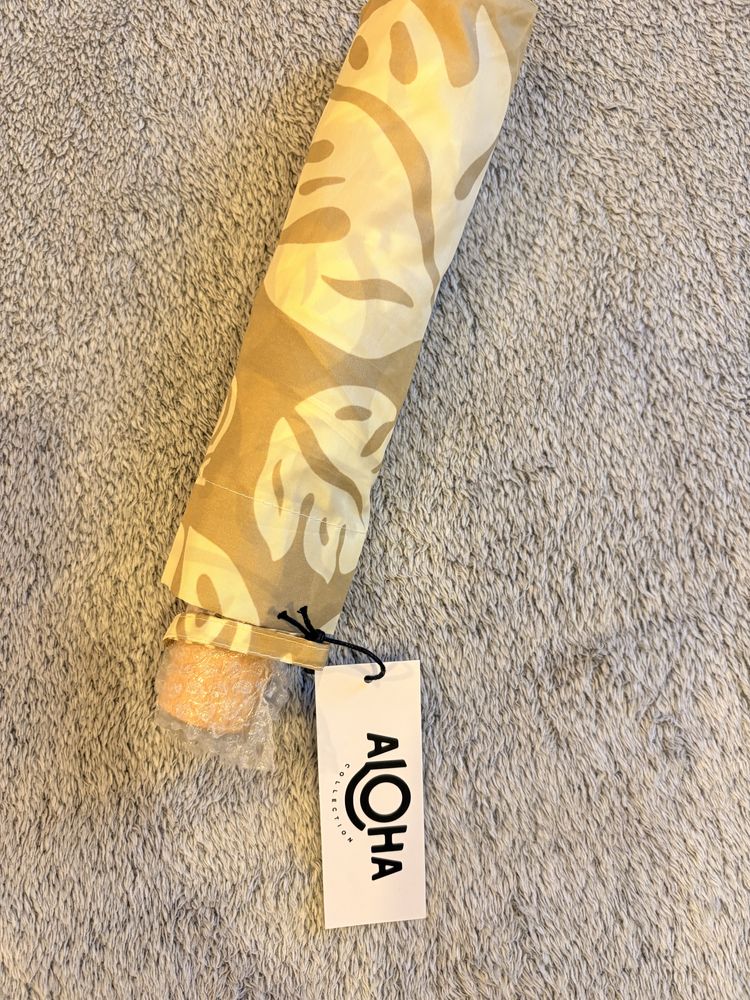 Нов чадър на Aloha
