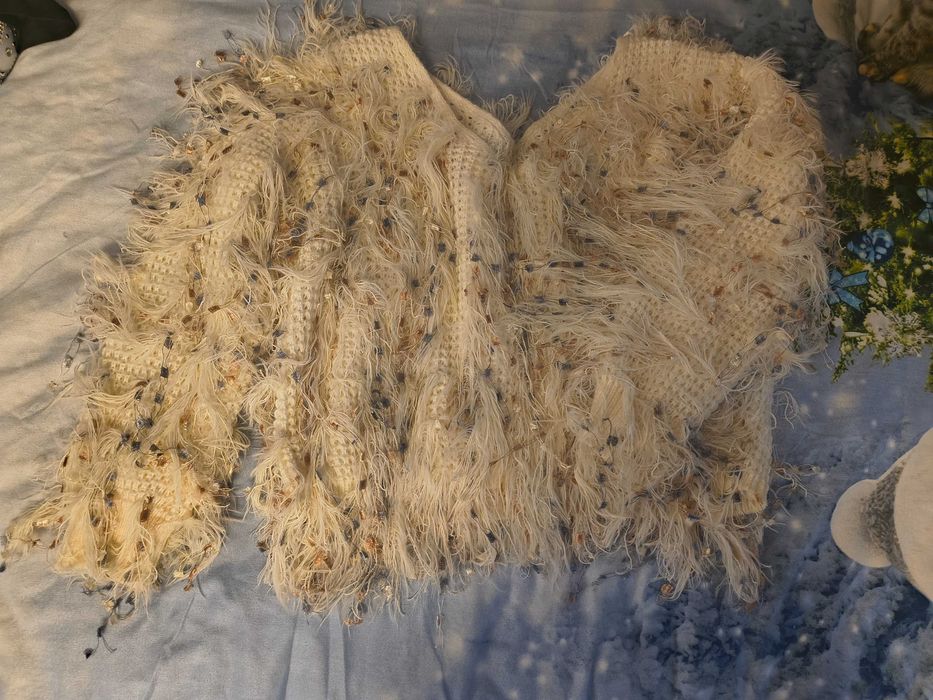 Зимни пуловери в различни цветове