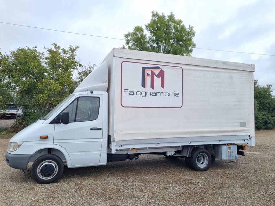 Mercedes sprinter 416 cu bena ficsa cu prelata care se inalta .