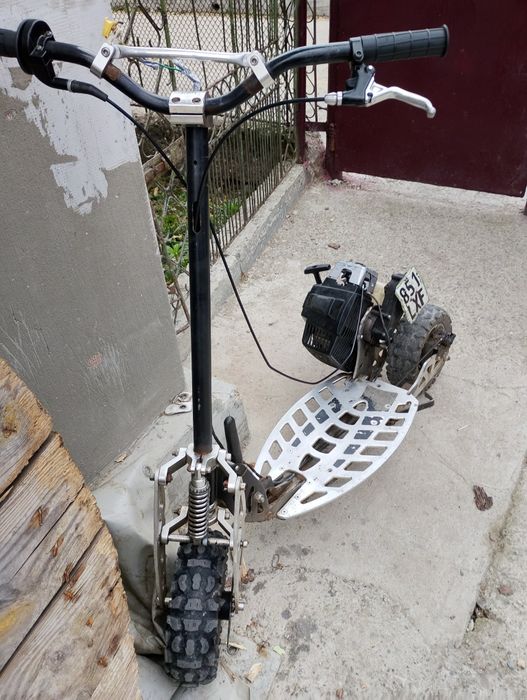 Vând trotineta Uber Scott 70x 71cc