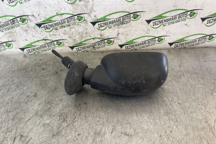 Oglinda stanga manuala E20103017 / E2 0103017 Dacia Logan prima gener