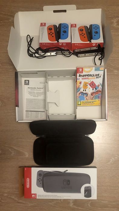 Consola Nintendo Switch cu accesorii și jocuri. Livrare gratuită!