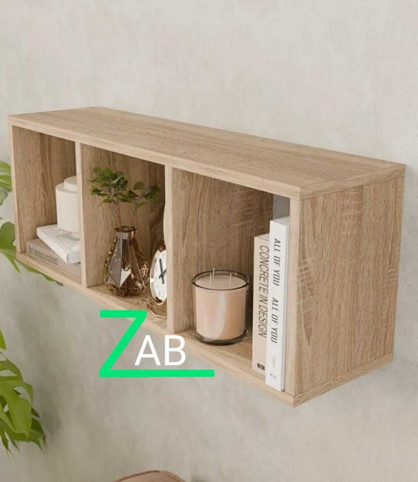 Навесная книжная полка удачное решение для гостиной и под телевизор.